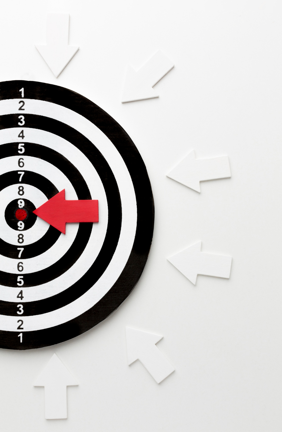 flat-lay-target-with-arrows-pointing-bullseye